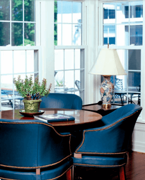 Wincore 7700 - blue chairs next to the window | Berkeley Exteriors